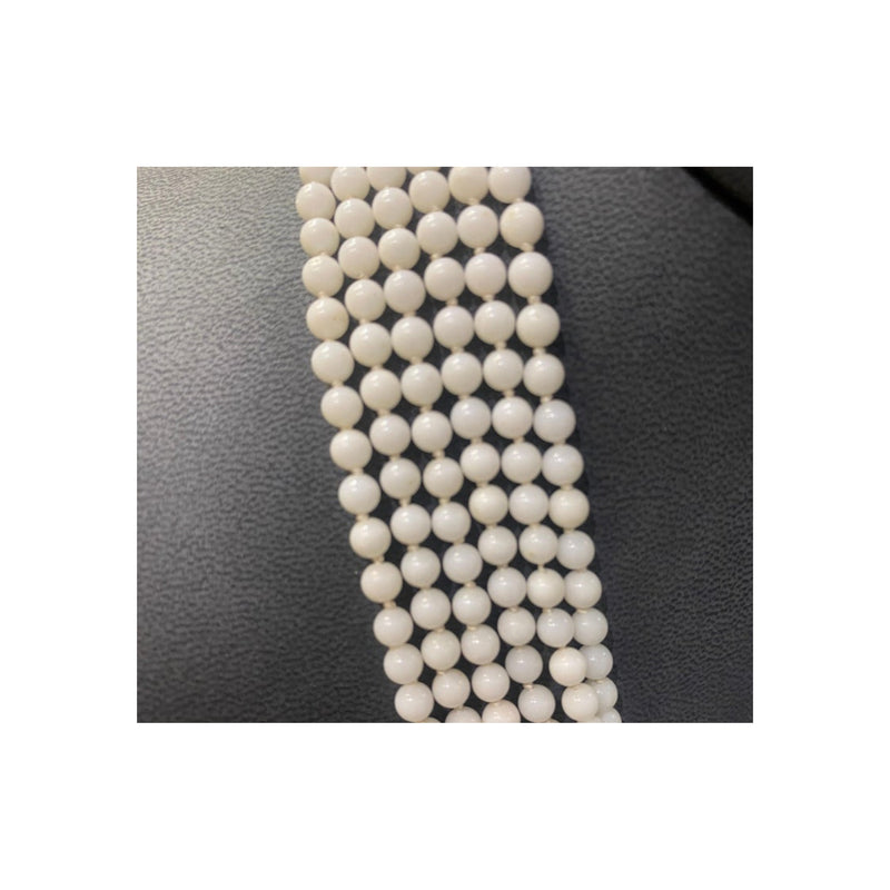 Six Strand White Coral Bead Necklace