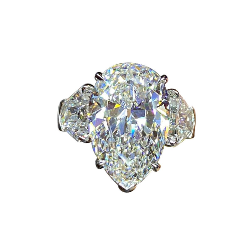 GIA Certified 8.73 Carat Pear Shape Diamond Three-Stone Ring