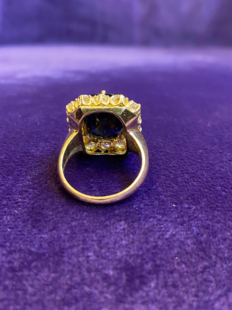 Oval Cut Sapphire & Diamond Halo Ring